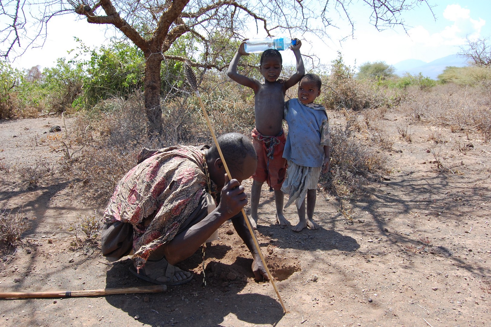 People of Hadzabe bush tribe looking for roots