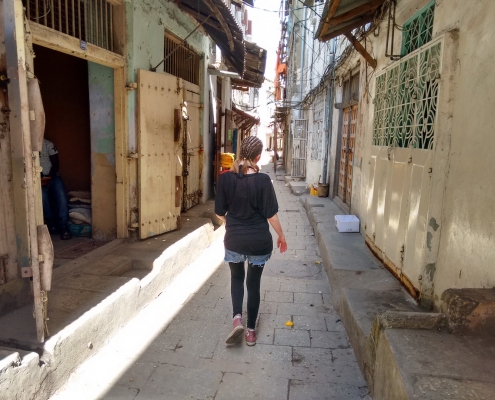 Safari Consultant Lisa walking the narrow streets of Stone Town