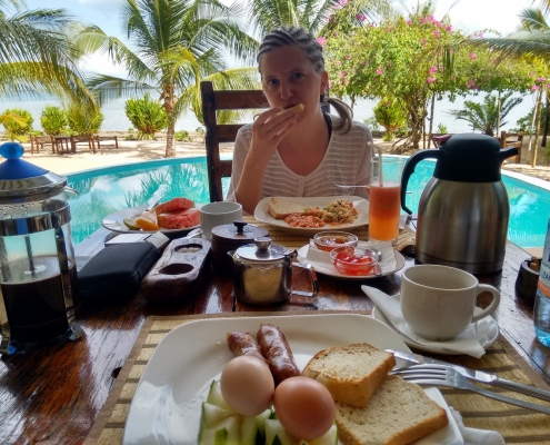 Milele Villas Zanzibar breakfast with swimming pool and Indean Ocean in the background
