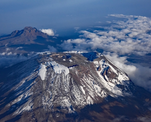 View of Mount Kilimanjaro with Kibo and Mawenzi peaks from the air