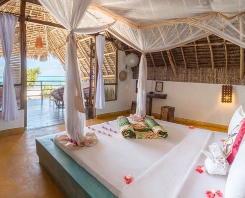 Sunshine Hotel Zanzibar full-size bed