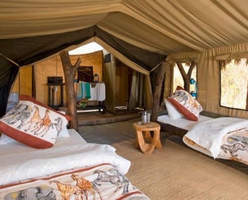 Tindiga Tented Camp full-size bed
